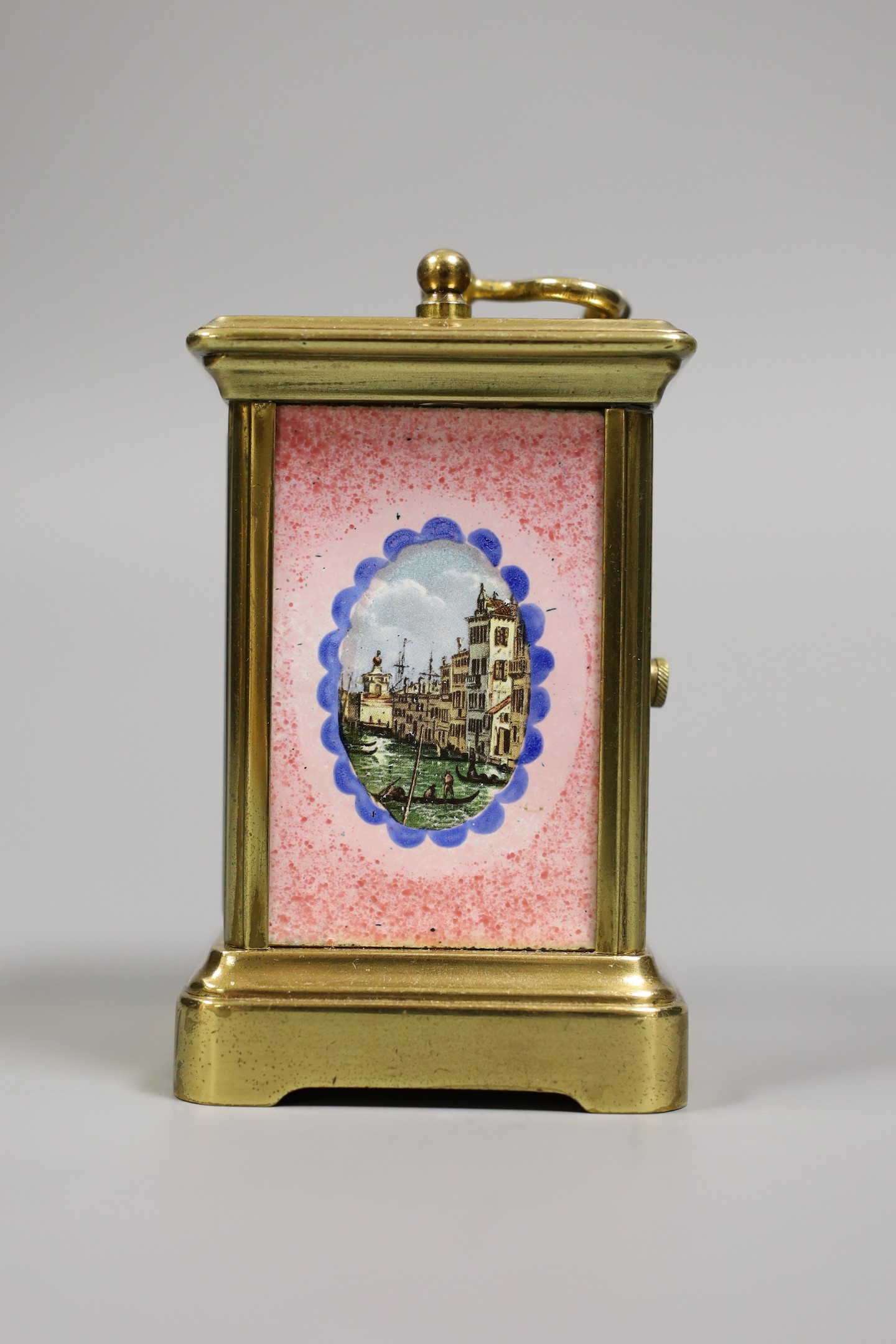 A miniature carriage timepiece, with enamelled side panels of Venice, 8 cms high